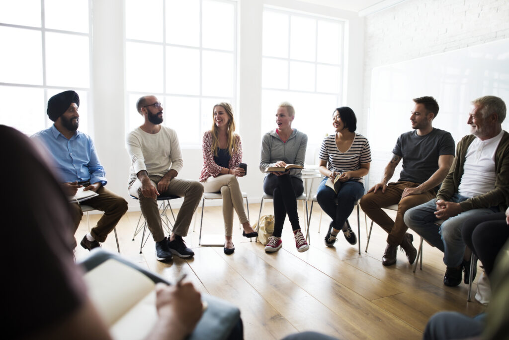 diverse group of people in a seminar